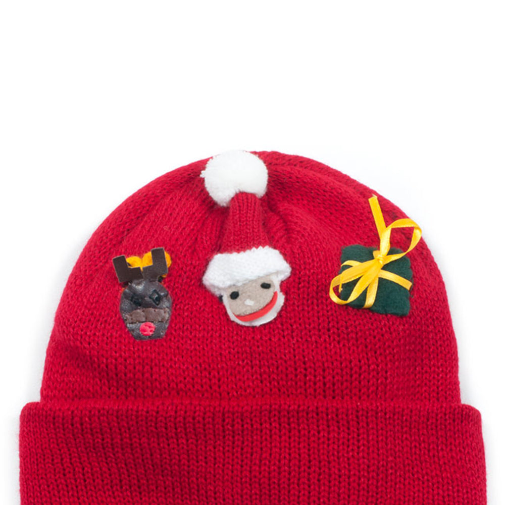 A cozy Christmas Knit Hat made from lightweight acrylic, featuring a festive design perfect for winter celebrations.