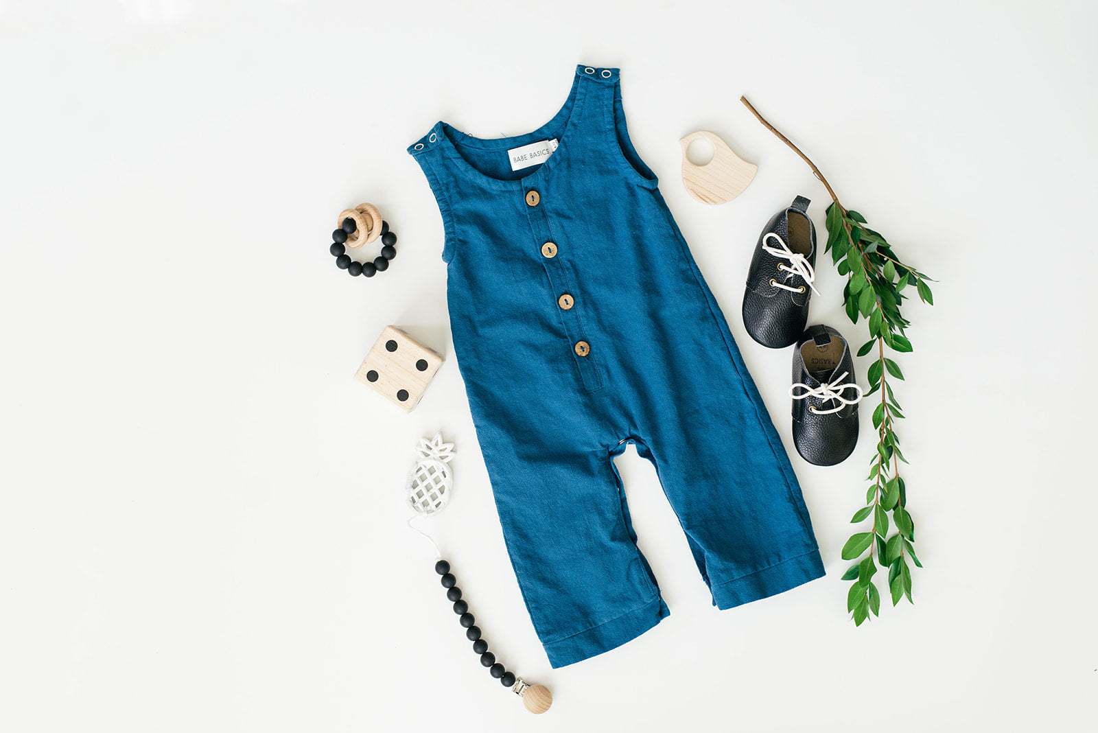 Cobalt Linen Basic Romper for babies, featuring diaper snaps and a stylish design, perfect for any occasion.