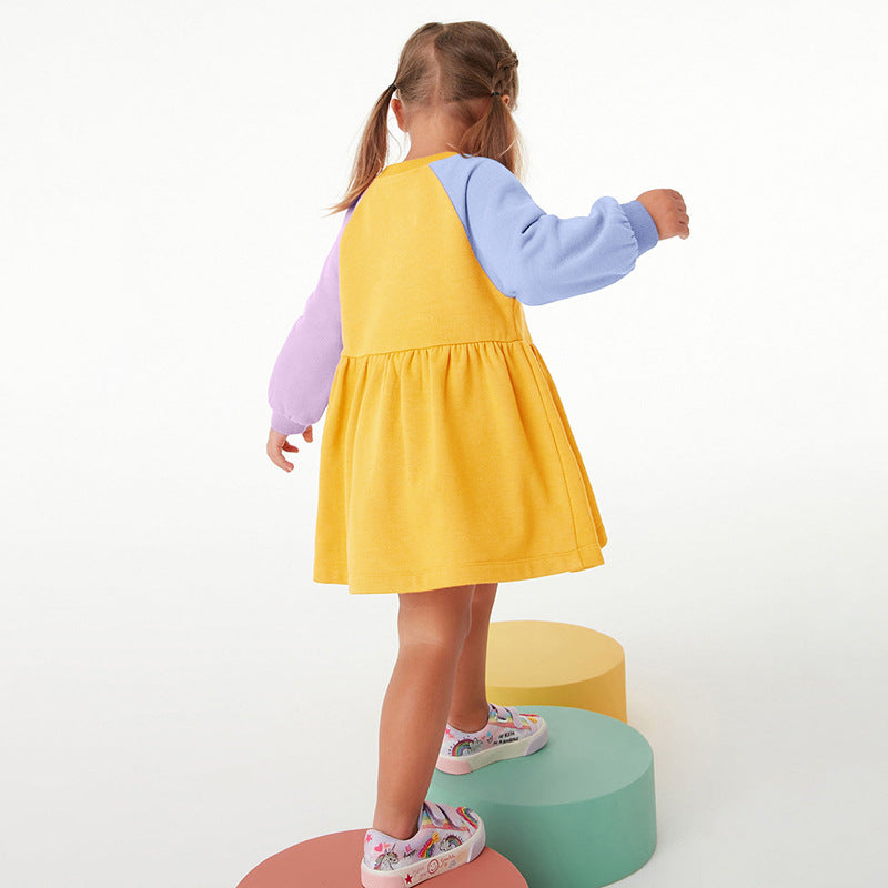 A vibrant yellow hoodie dress for girls featuring a cute cartoon pattern, perfect for autumn wear.