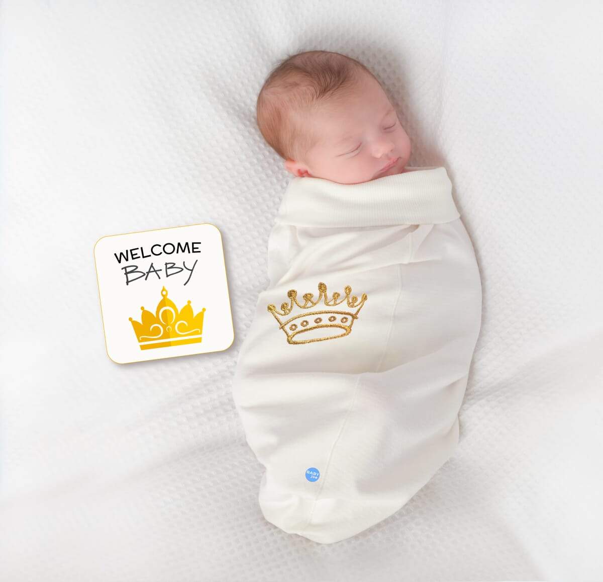 Crown Baby cocoon swaddle set featuring soft fabric, matching headpiece, and announcement card, perfect for newborns.