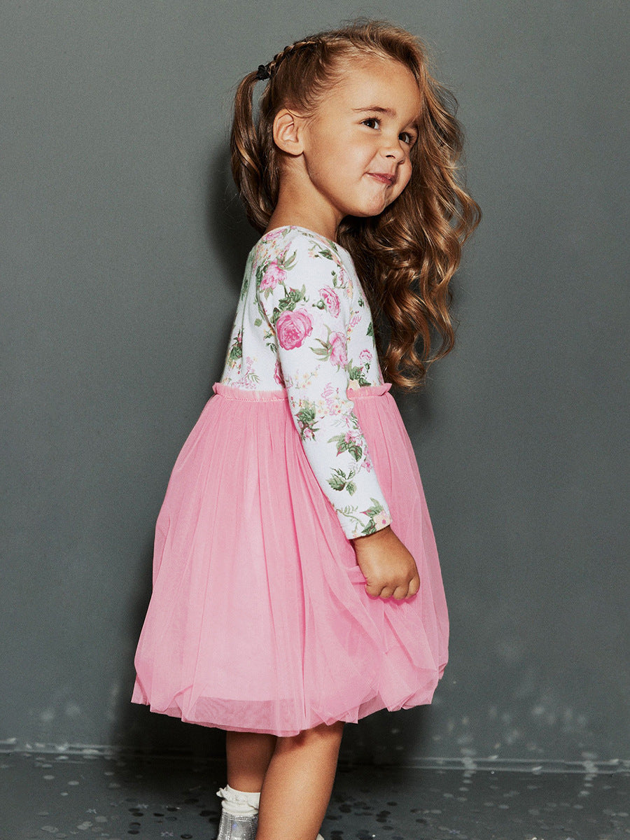 A pink tulle dress for girls featuring a floral pattern, long sleeves, and a crew neck, perfect for autumn and spring seasons.