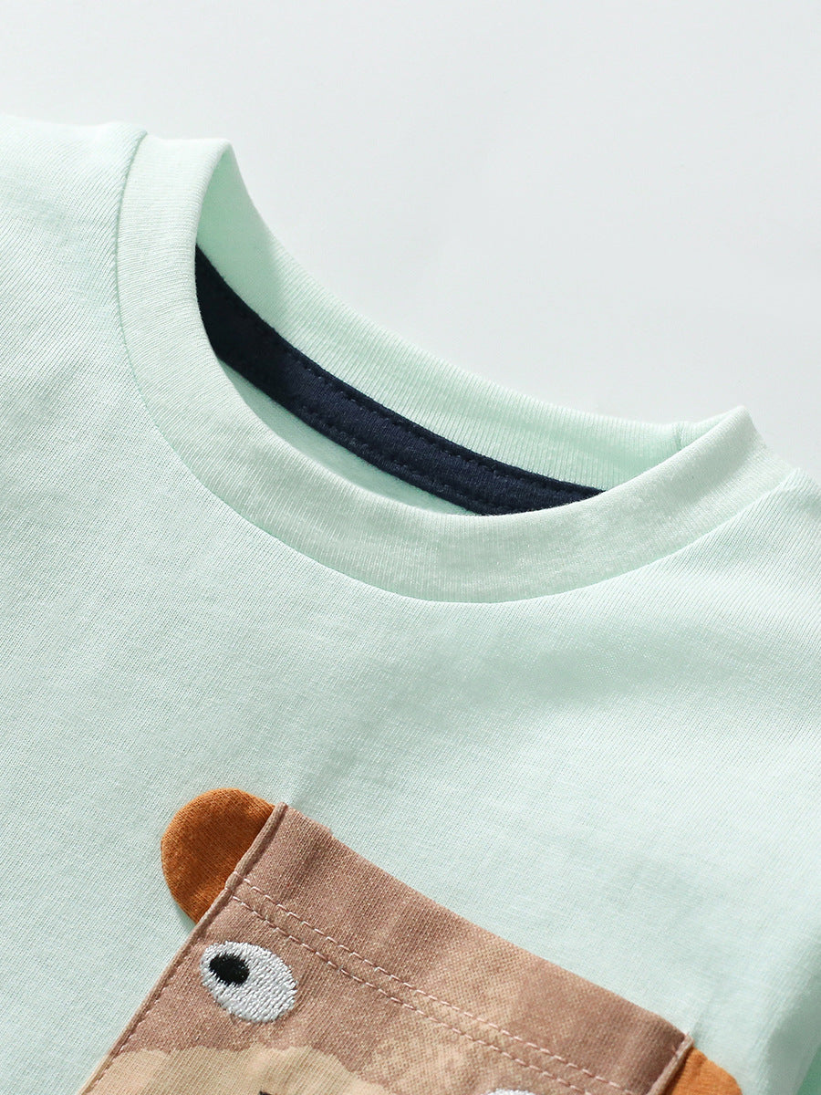 A vibrant green long-sleeve shirt featuring cartoon animal patterns, perfect for kids in spring and autumn.