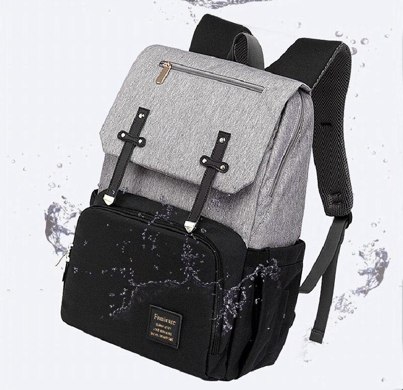 Stylish Diaper Bag Mummy Daddy Backpack in grey and black, featuring waterproof Oxford material and USB charging capability.