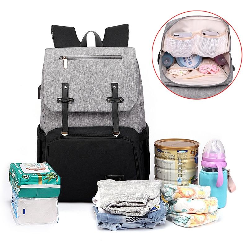 Stylish Diaper Bag Mummy Daddy Backpack in grey and black, featuring waterproof Oxford material and USB charging capability.