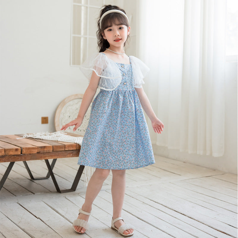 A charming blue dress with a ditsy flower pattern and mesh flying sleeves, perfect for summer wear for girls aged 5-12.