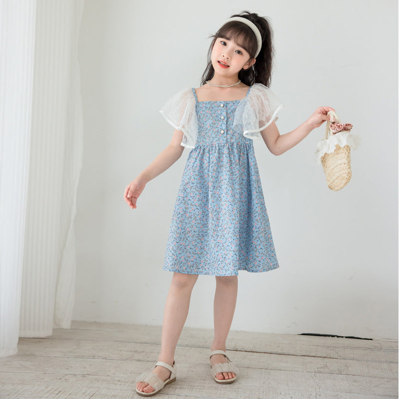 A charming blue dress with a ditsy flower pattern and mesh flying sleeves, perfect for summer wear for girls aged 5-12.