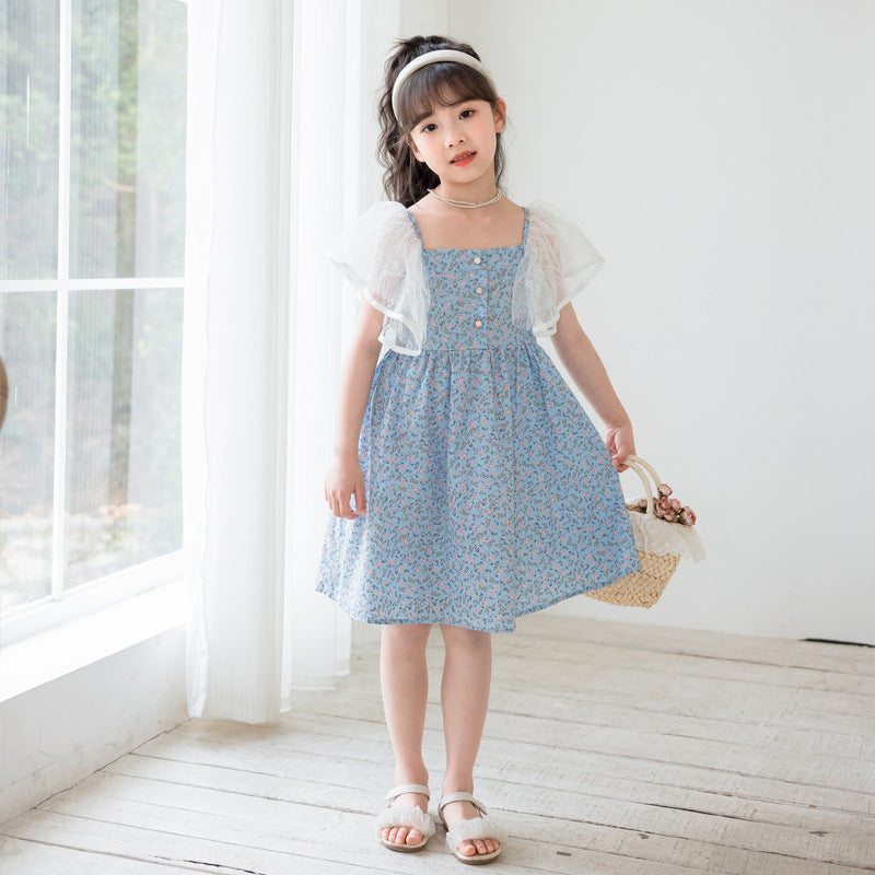 A charming blue dress with a ditsy flower pattern and mesh flying sleeves, perfect for summer wear for girls aged 5-12.