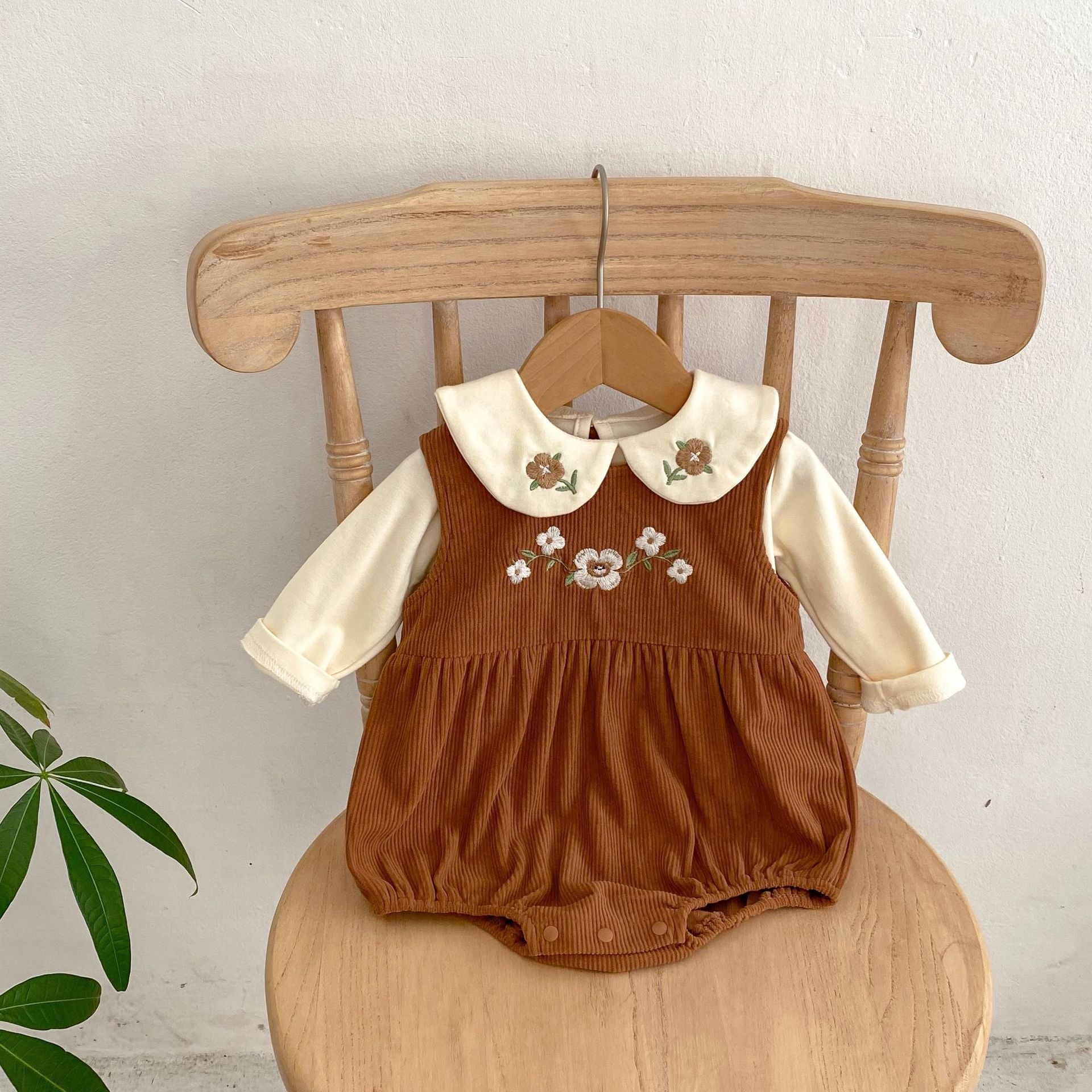 Embroidered Design Triangle Onesies with Blouse Sets in brown color for baby girls, featuring floral embroidery and a stylish blouse.