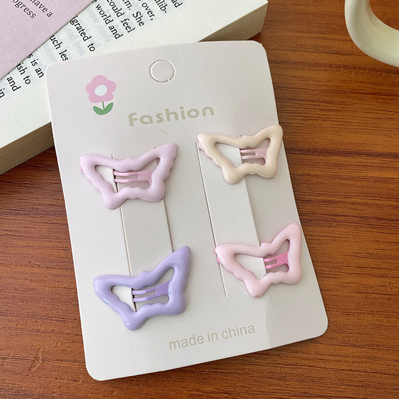 Enchanting Pink and Purple hair clip accessories for girls, featuring vibrant colors and a stylish design.