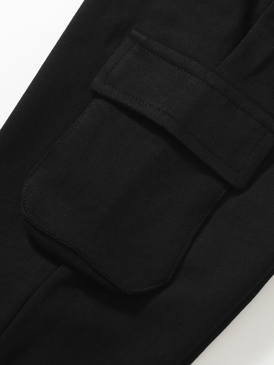 European and American Children’s Autumn Cotton Boys’ Work Pants in black, showcasing a solid pattern and comfortable fit for active boys.