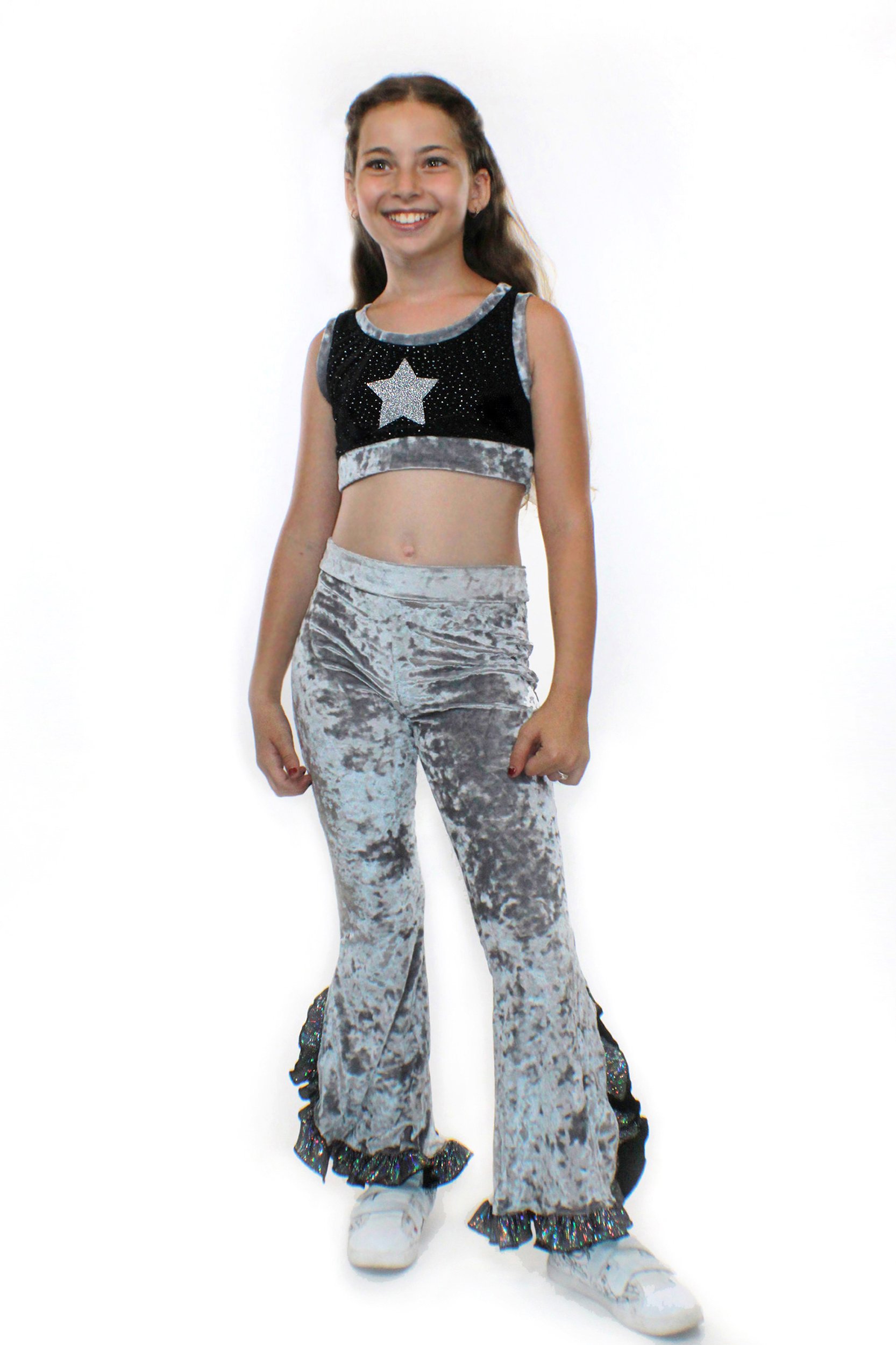 Eve silver crushed velvet flared pants with holographic sequin trim and knee-high slit, showcasing a stylish vintage look.