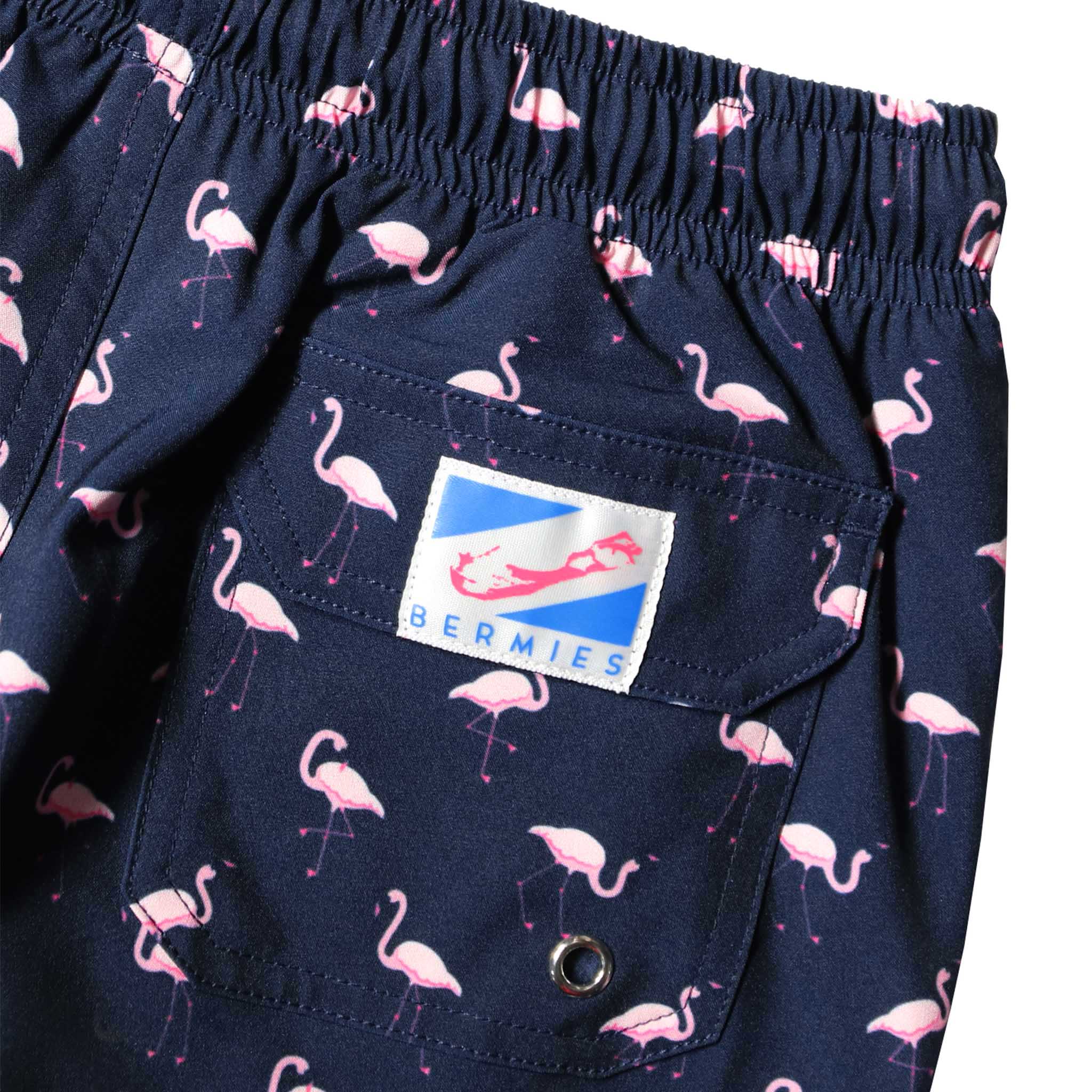 Flamingo Kids Swim Trunks featuring vibrant colors and a comfortable design, perfect for summer fun.