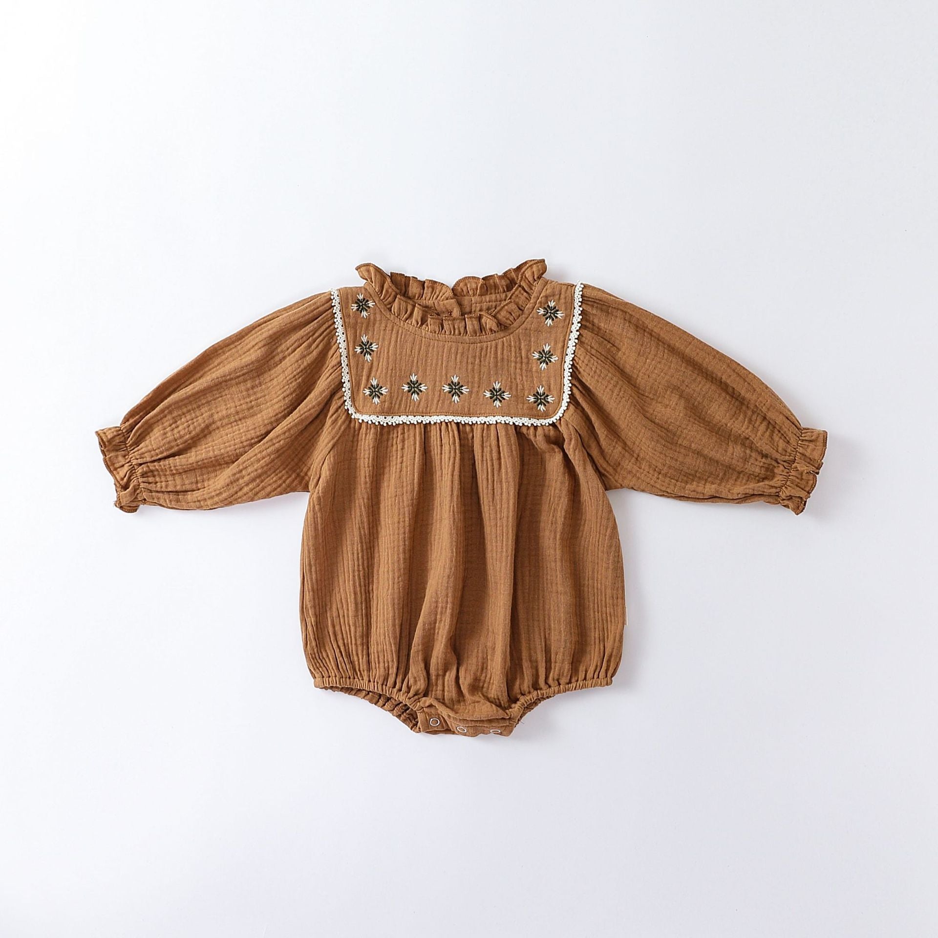 Floral Embroidered Design Long Sleeve Onesies in white and brown colors, showcasing delicate floral patterns and soft cotton fabric.