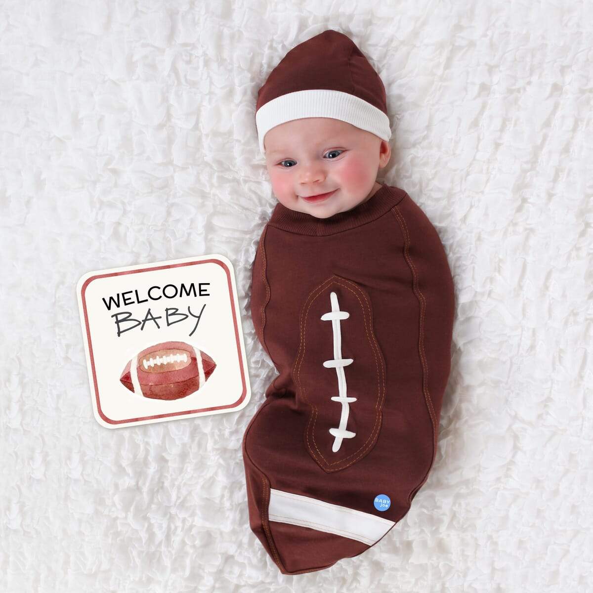 Football Baby cocoon swaddle set with matching headpiece and announcement card, made of soft cotton and Lycra, perfect for newborns.