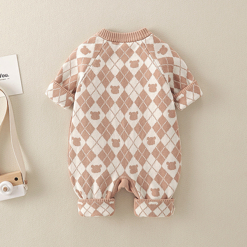 A brown cotton romper featuring a geometric pattern and a cartoon bear patch, suitable for baby boys and girls.