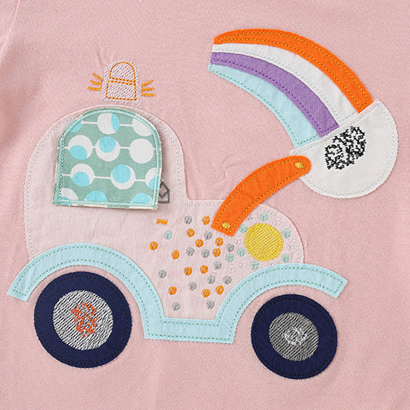 Girls’ pink short sleeve t-shirt featuring a cartoon rainbow digger pattern, perfect for summer wear.