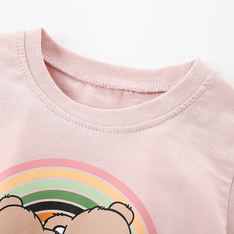 Girls’ pink short sleeves t-shirt featuring a cute cartoon teddy bear pattern, perfect for summer wear.