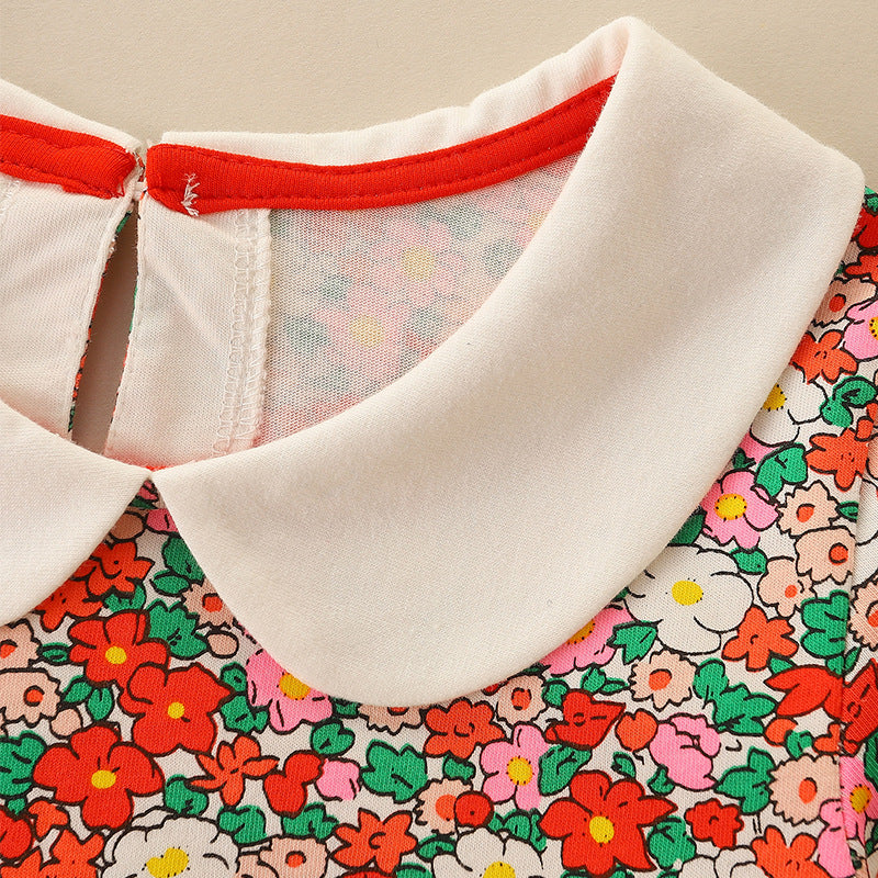 Girls’ European-American Style Peter Pan Collar Dress in white and red colors, featuring a stylish collar and floral patterns.