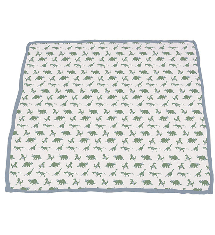 Granite Green Dinosaurs and Blue Fog Cotton Newcastle Blanket, featuring a playful dinosaur design on soft cotton fabric.