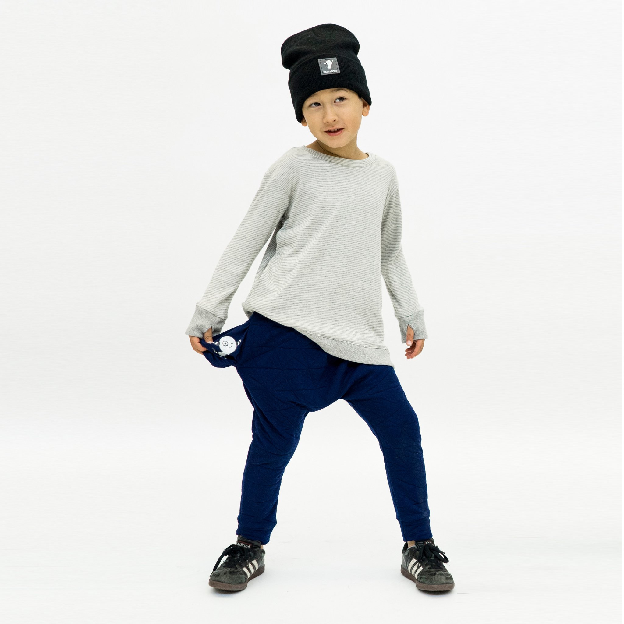 Youth Hammer Pants in Quilted Deep Blue with hidden monster pocket, showcasing drop crotch harem style and soft fabric.