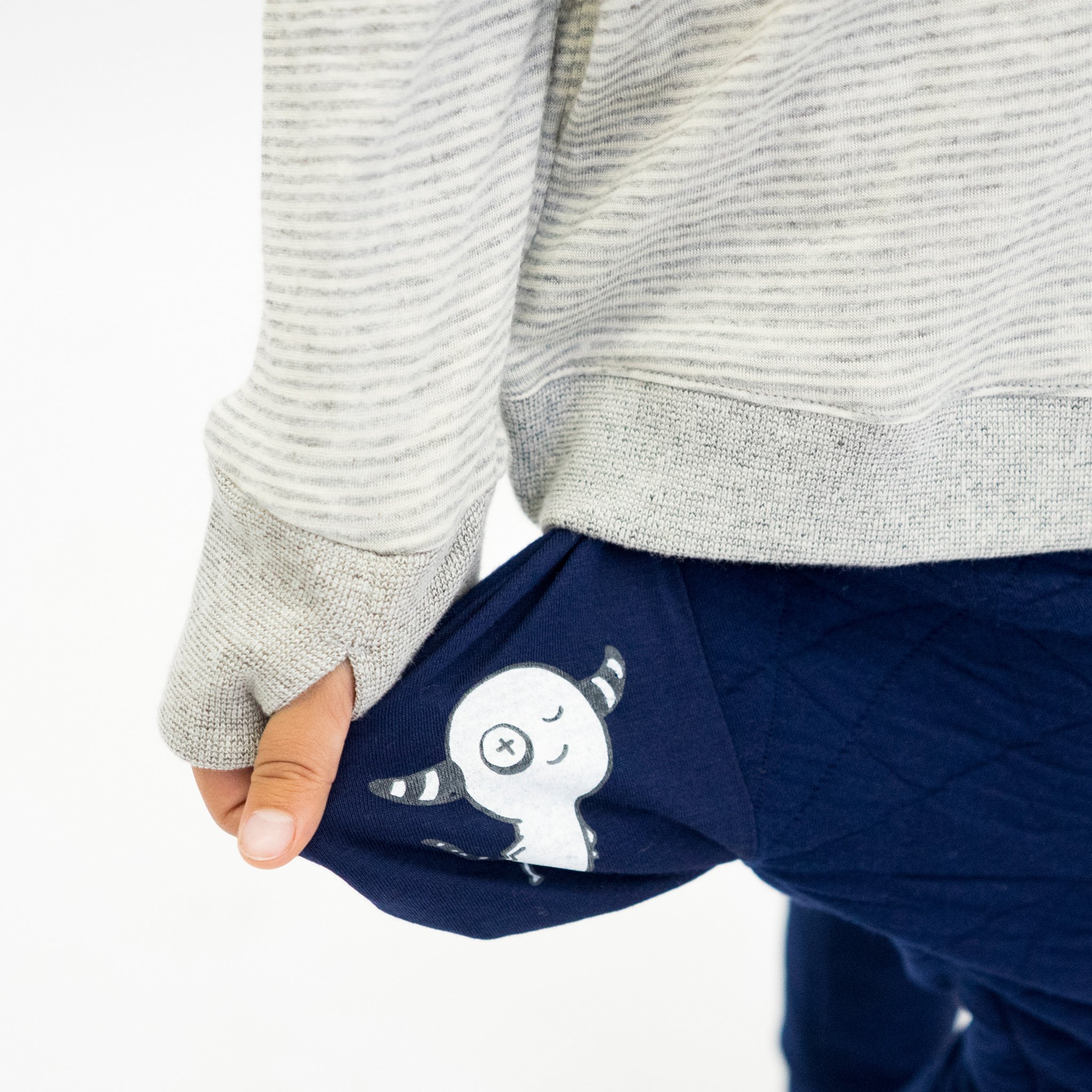 Youth Hammer Pants in Quilted Deep Blue with hidden monster pocket, showcasing drop crotch harem style and soft fabric.