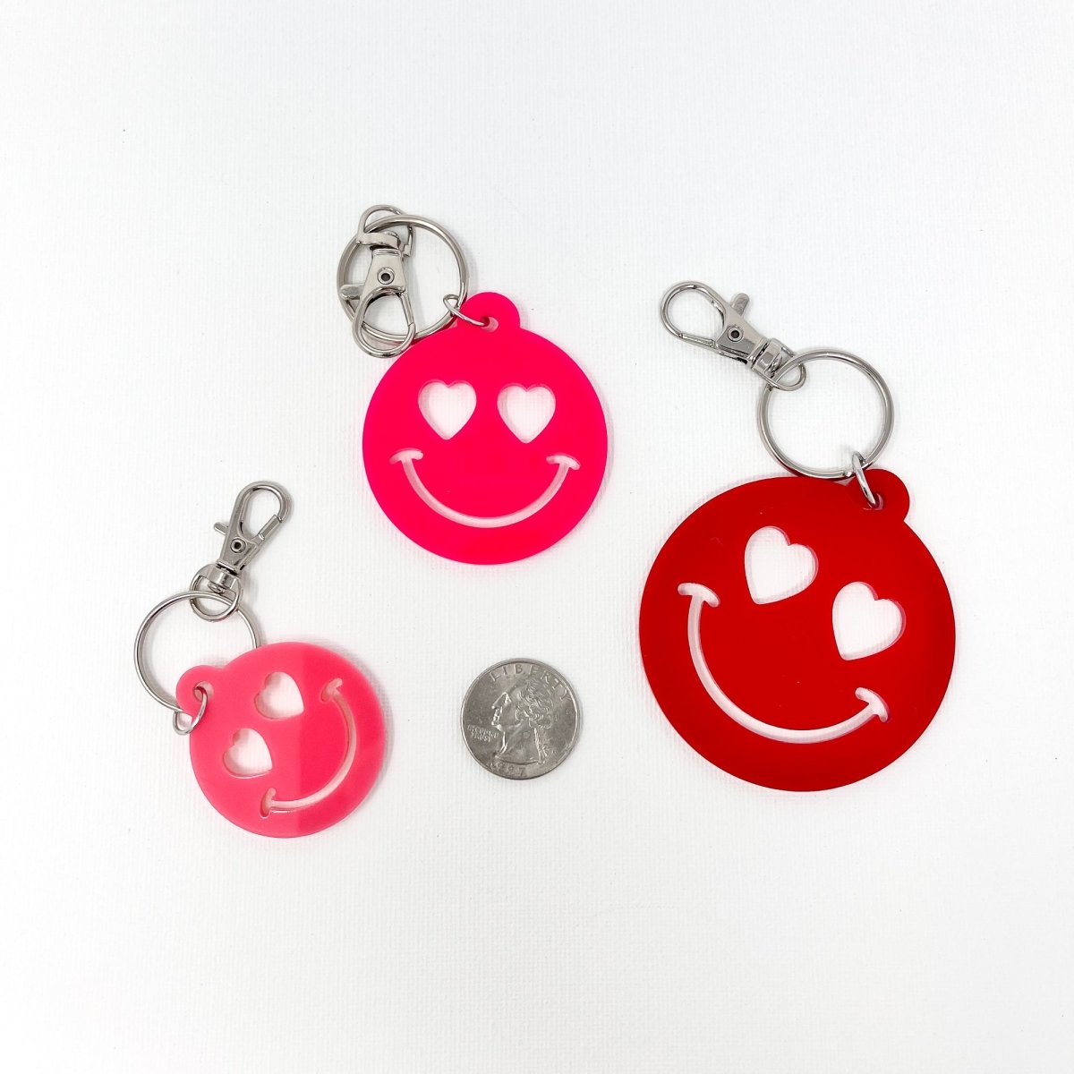 Colorful Heart Smiley Face Keychain made of acrylic, showcasing its cheerful design and vibrant colors.