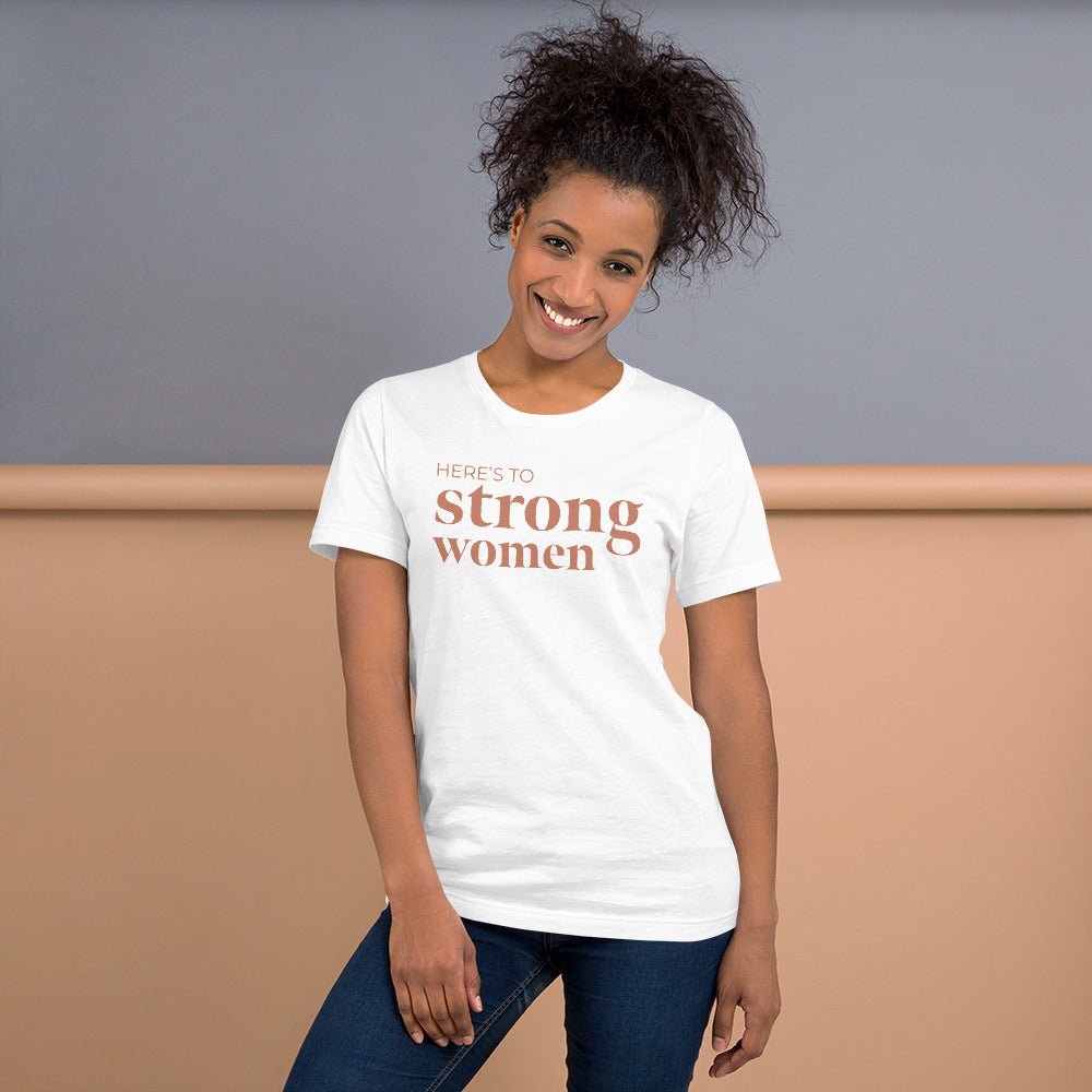 A soft and lightweight t-shirt featuring the empowering phrase 'Here's to Strong Women' in stylish typography.