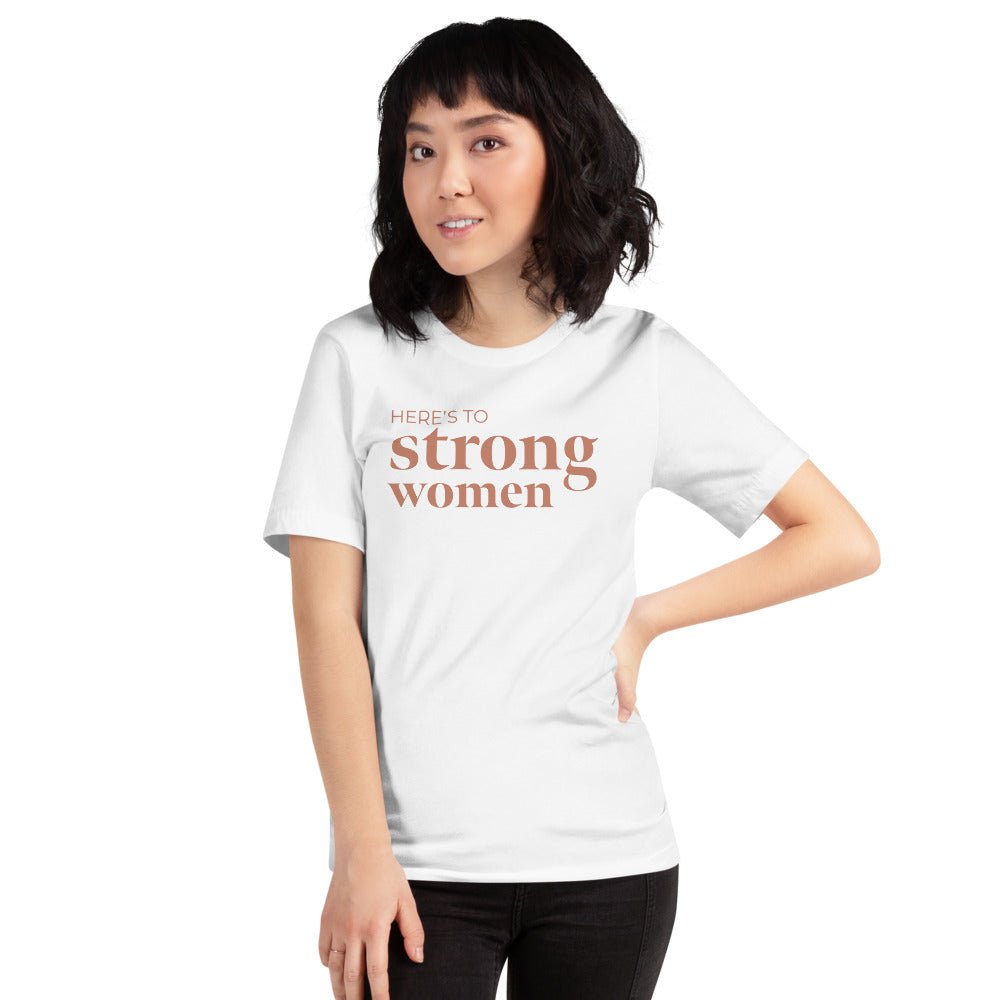 A soft and lightweight t-shirt featuring the empowering phrase 'Here's to Strong Women' in stylish typography.