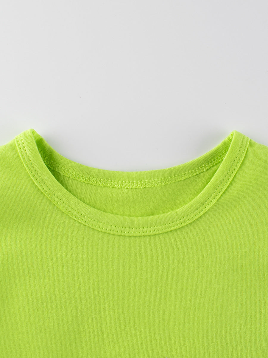 A vibrant solid green t-shirt for baby boys, made from soft cotton, perfect for summer wear.