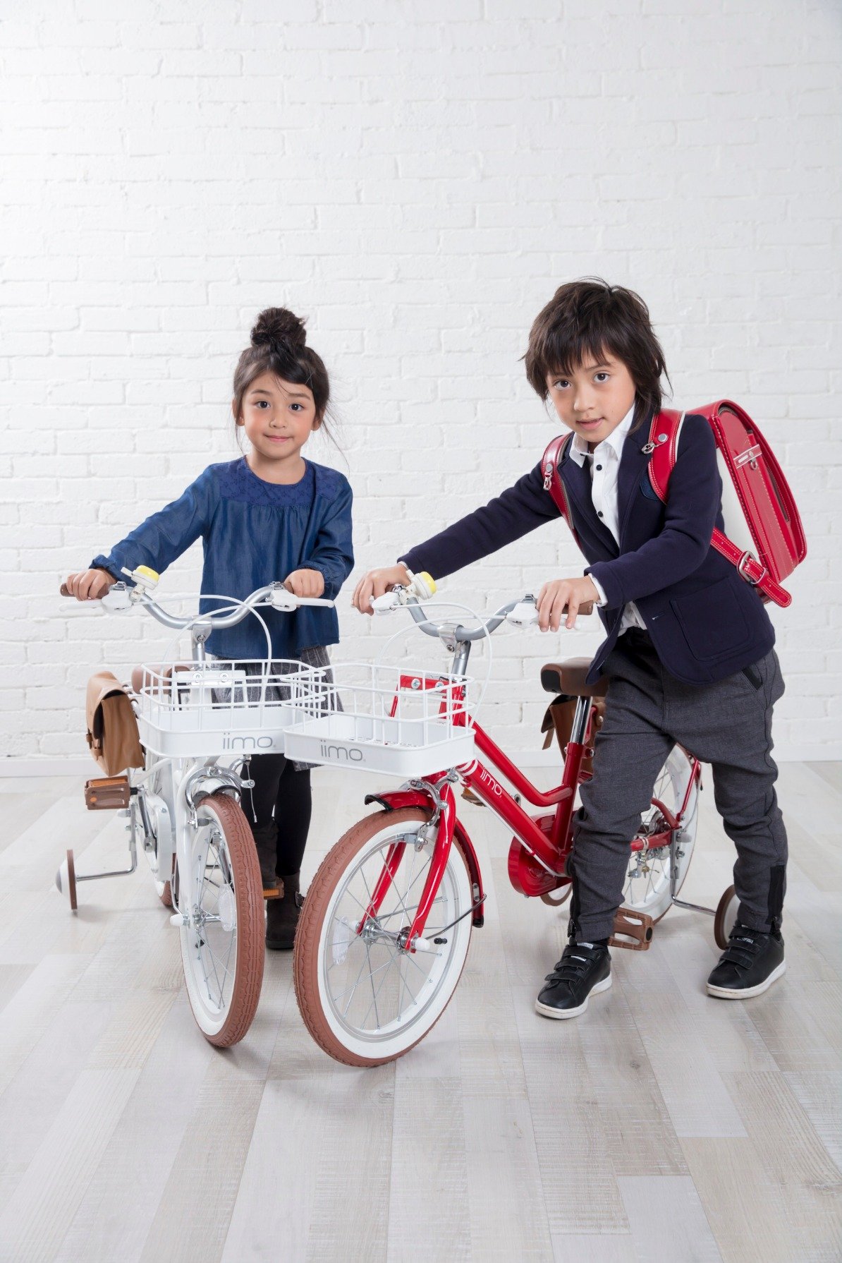 iimo Kid's Bicycle in Eternity Red with detachable basket and stylish bag, designed for children aged 3-6.