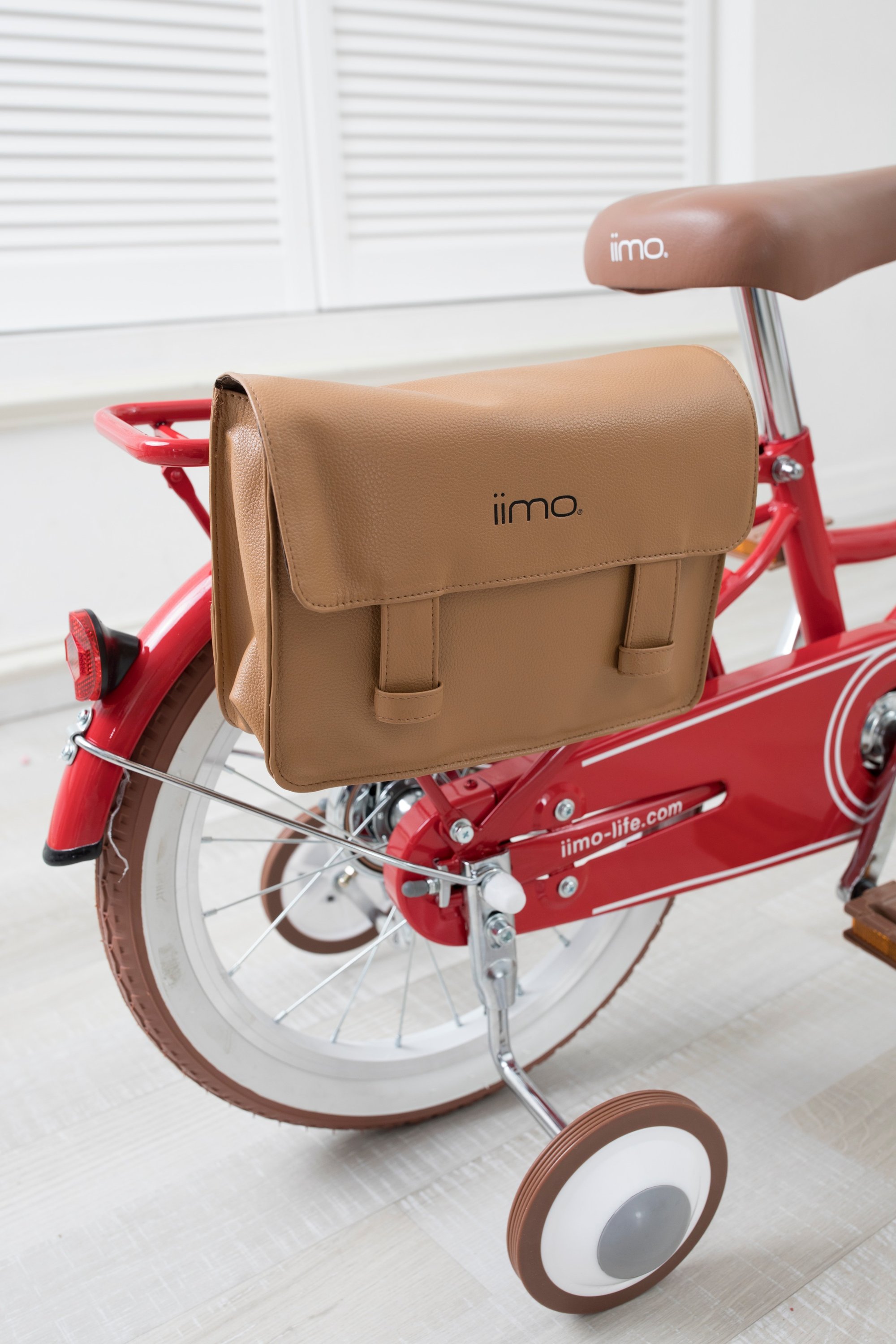 iimo Kid's Bicycle in Eternity Red with detachable basket and stylish bag, designed for children aged 3-6.