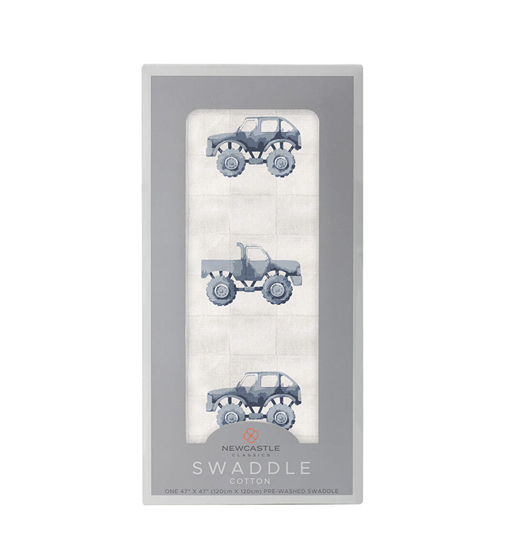 Indigo Monster Trucks Cotton Swaddle featuring playful truck designs on soft muslin fabric, perfect for swaddling and versatile baby care.