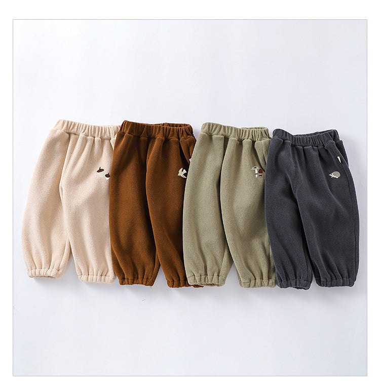 Infant winter pants in four colors: green, grey, apricot, and brown, made from soft Orlon fleece, suitable for boys and girls.