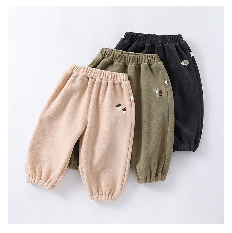 Infant winter pants in four colors: green, grey, apricot, and brown, made from soft Orlon fleece, suitable for boys and girls.