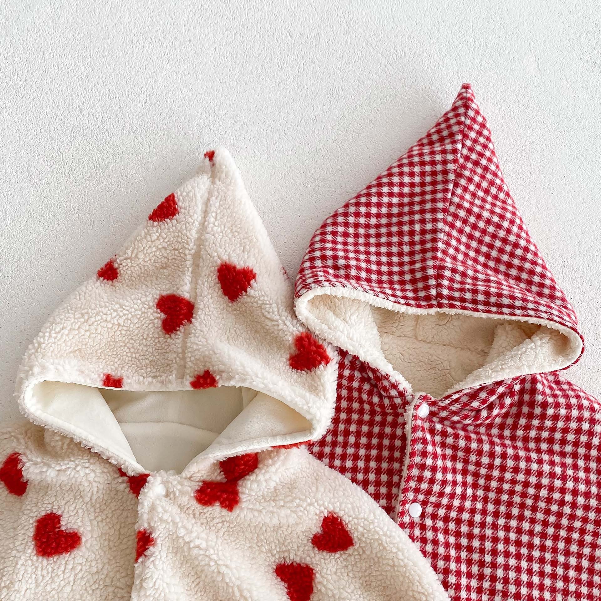 A cozy thick warm cloak for baby girls in red and apricot colors, featuring plaid and heart patterns, perfect for winter wear.