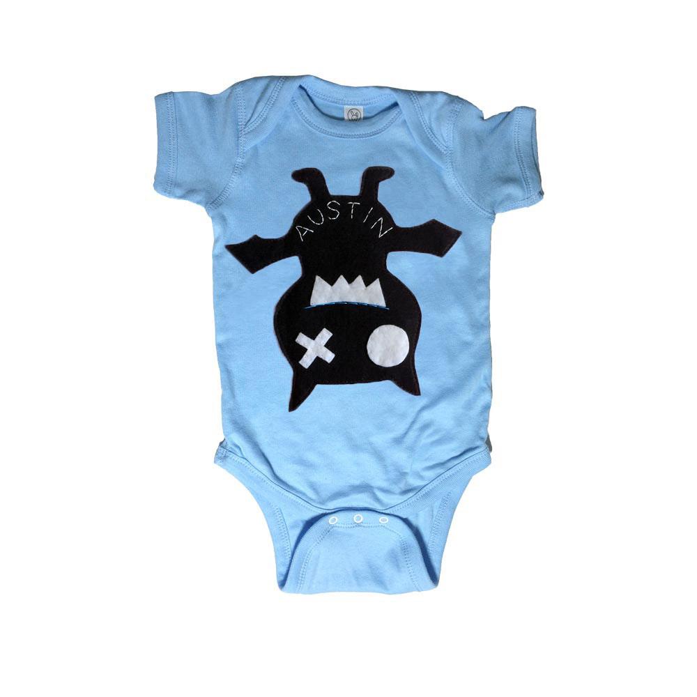 Keep Austin Weird! Baby Bodysuit featuring unique felt appliqué design, handmade in Austin, Texas.