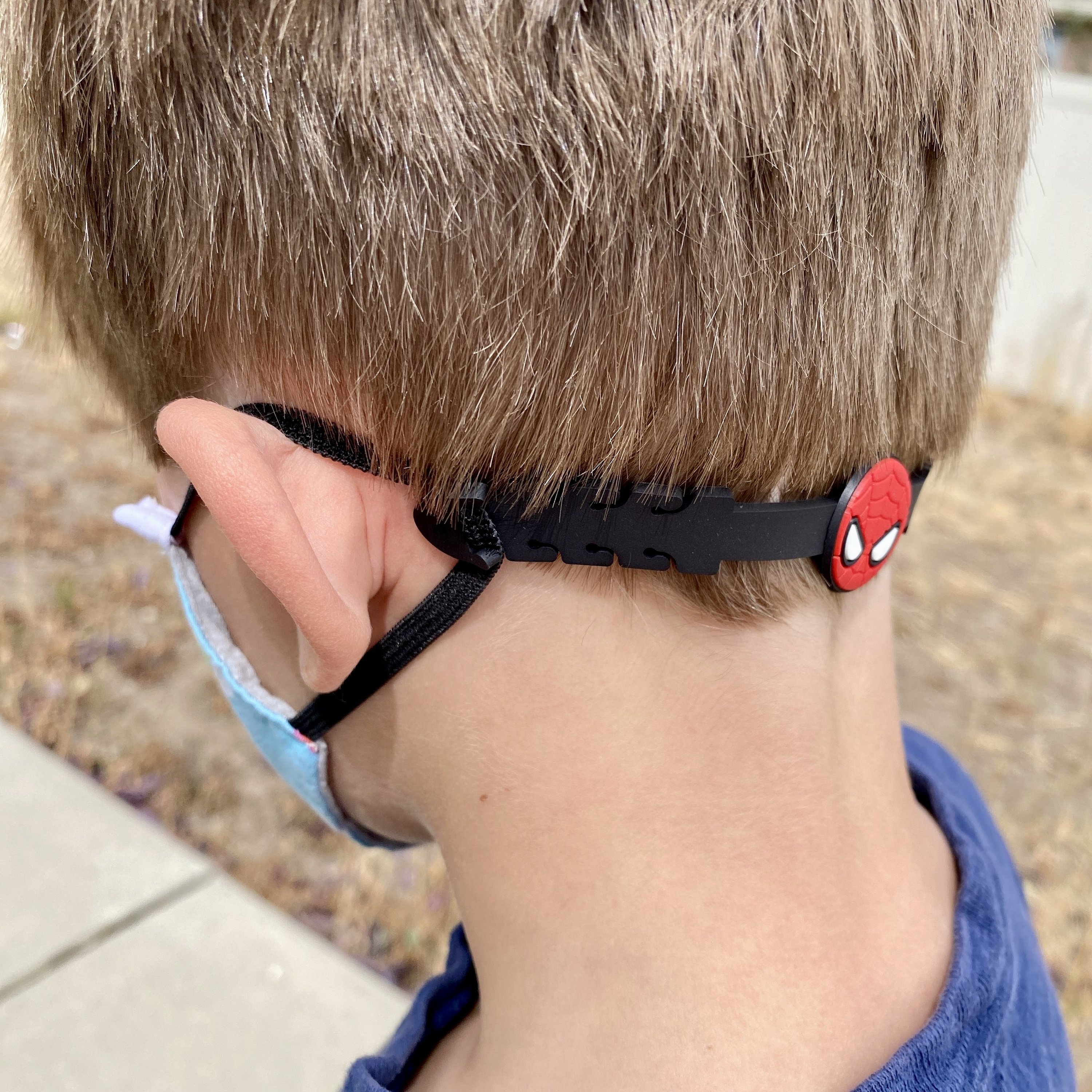 Colorful silicone mask extenders designed for kids, providing comfort and preventing ear pain while wearing masks.