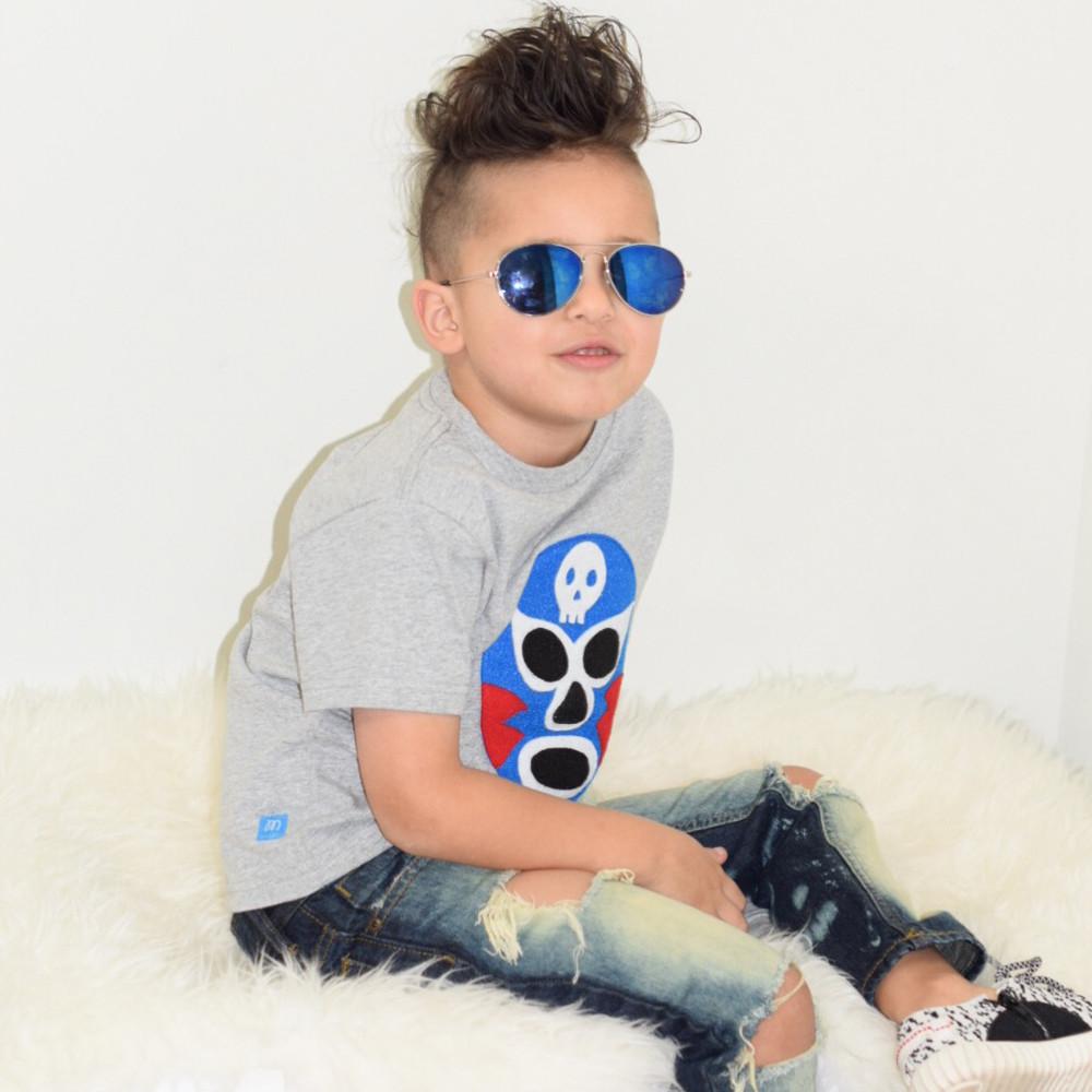 Vibrant Luchador Azul Kids T-shirt featuring colorful appliqué design, perfect for adventures.