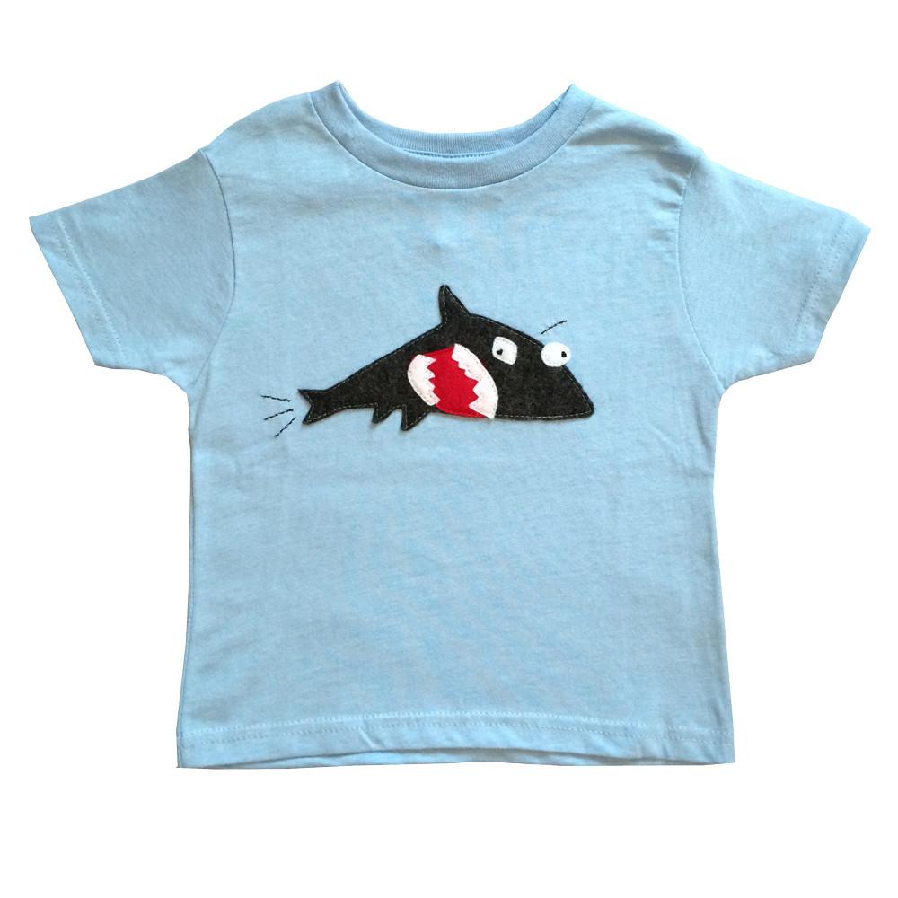 Kids T-shirt featuring a playful shark and fish design, handmade and hand-stitched by mi cielo in collaboration with Matthew Langille.