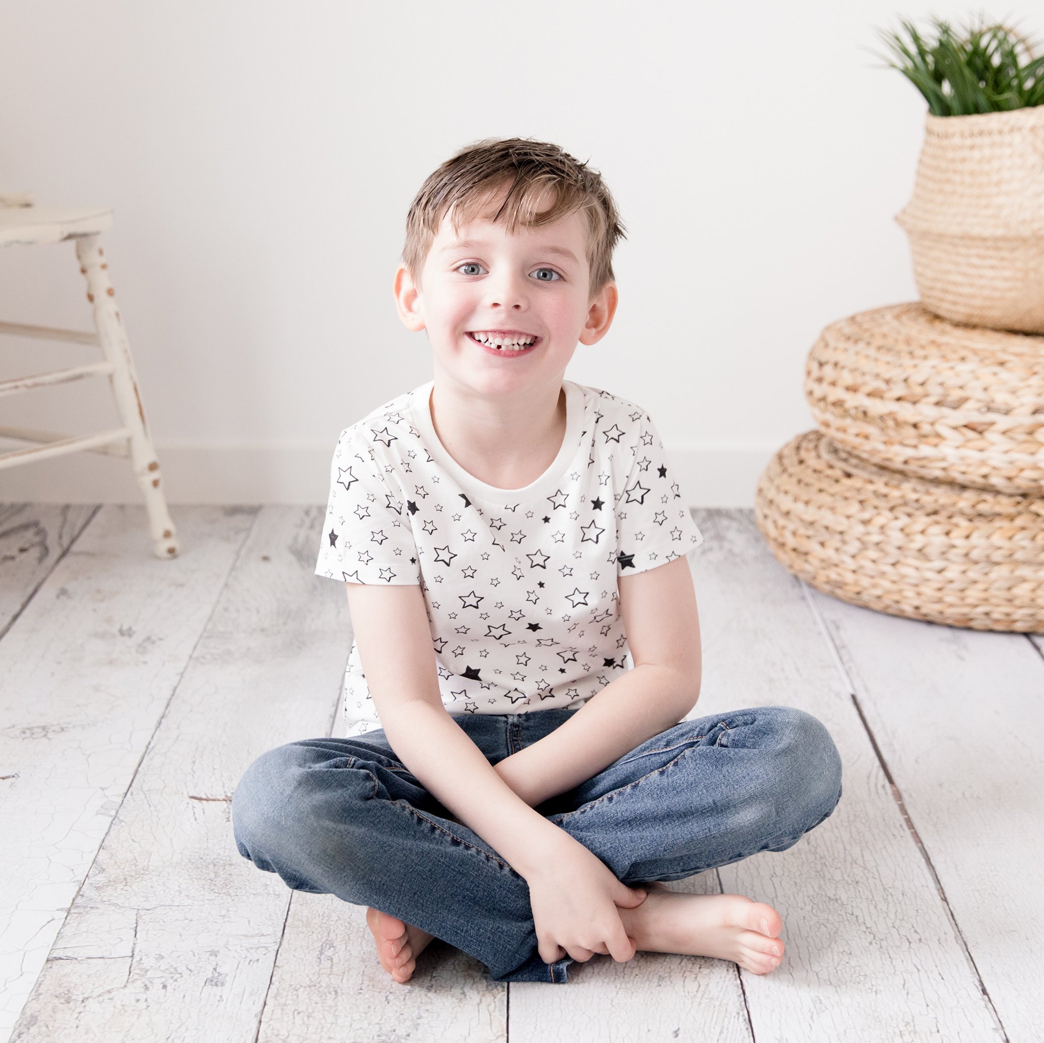 Kinsey tee in Starry design, featuring short sleeves and contrast color binding, made from stretchy cotton blend for kids.