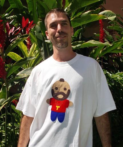 Looks Like Mr. Tee Adult T-Shirt featuring red and blue colors with unique felt appliqué designs and a golden necklace.