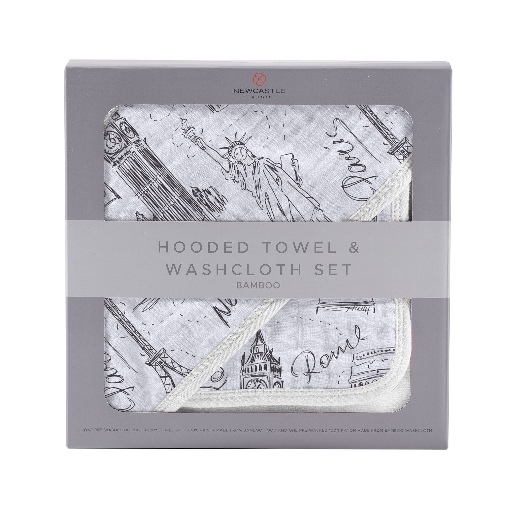 A soft bamboo hooded towel featuring designs of London, Paris, and New York, accompanied by a matching washcloth, perfect for babies.