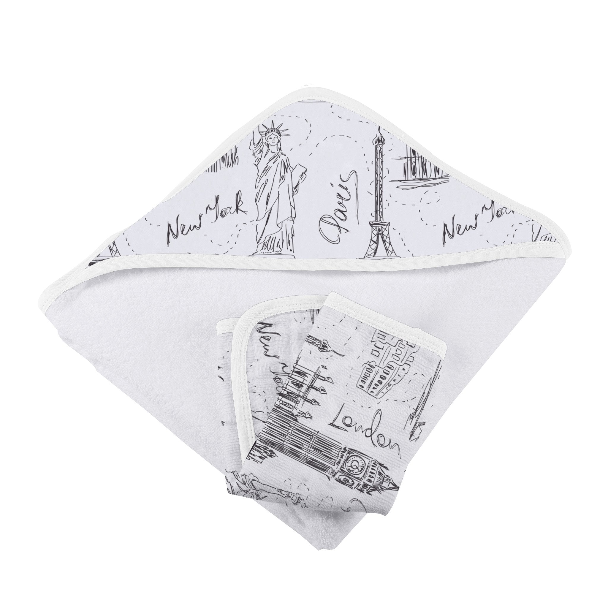 A soft bamboo hooded towel featuring designs of London, Paris, and New York, accompanied by a matching washcloth, perfect for babies.