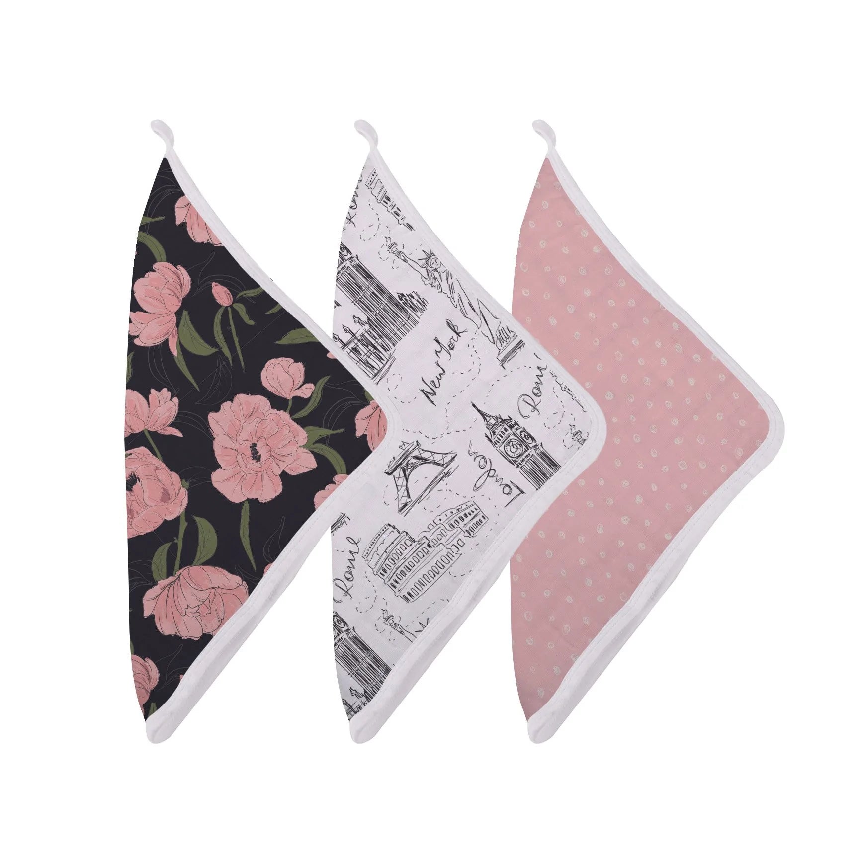 A colorful set of bamboo washcloths featuring prints inspired by London, Paris, and New York, with an attached loop for drying.