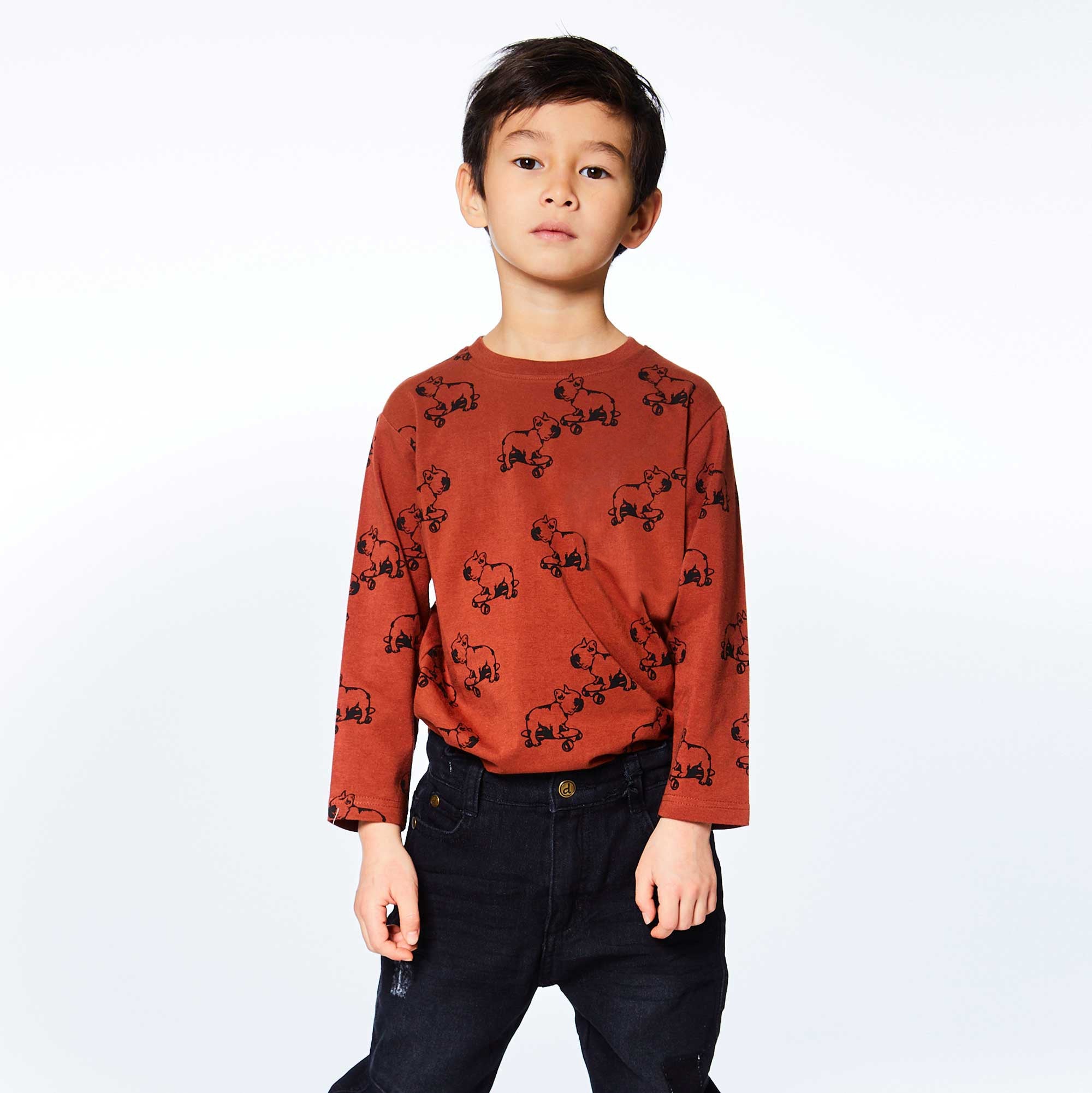 Long Sleeve Jersey Printed Top featuring playful bulldogs on skateboards, perfect for casual wear.