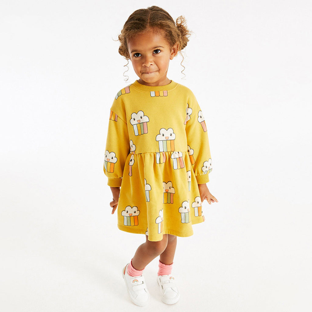 Lovely yellow cartoon pattern loose autumn dress for girls, made from soft cotton, perfect for playful activities.