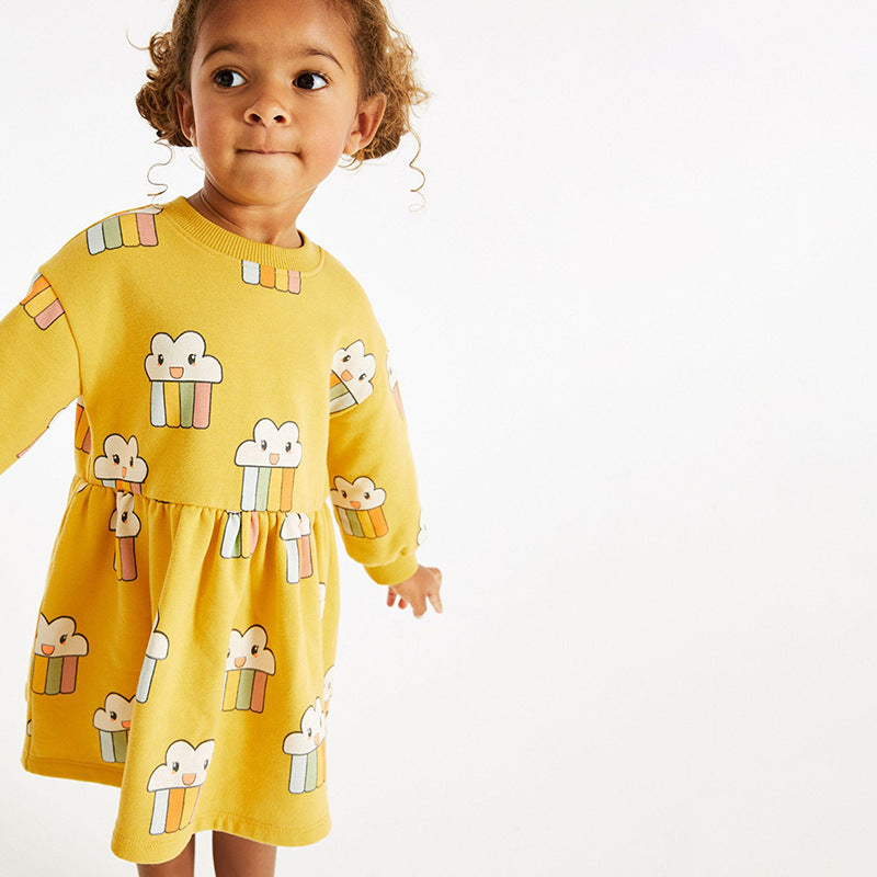 Lovely yellow cartoon pattern loose autumn dress for girls, made from soft cotton, perfect for playful activities.