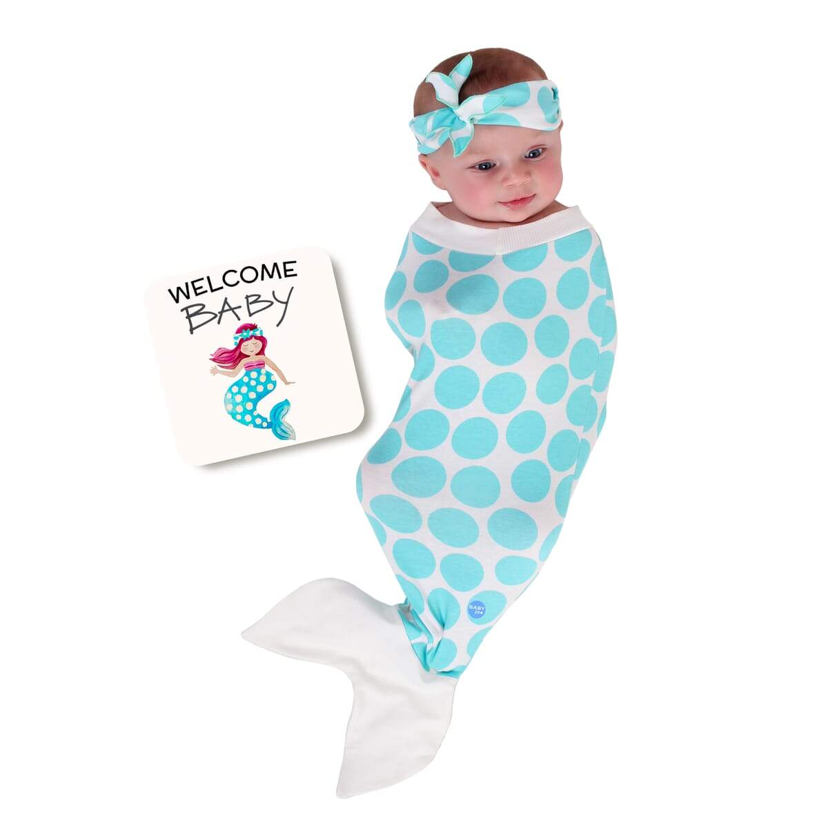 Mermaid Baby cocoon swaddle set featuring soft fabric, matching headpiece, and announcement card, designed for newborn comfort.