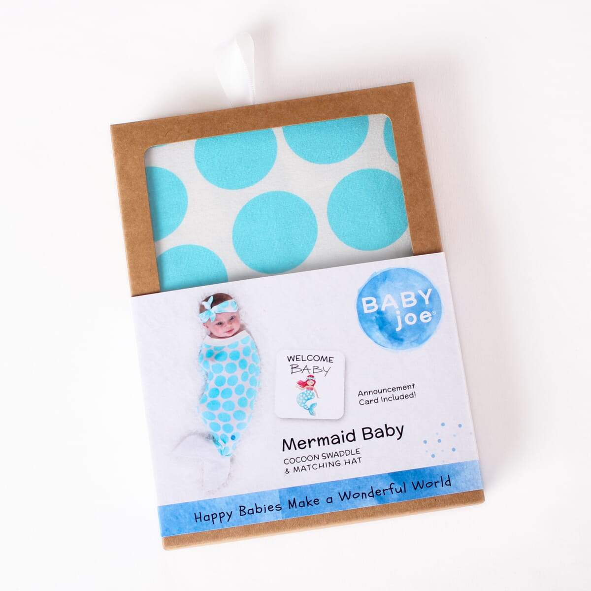 Mermaid Baby cocoon swaddle set featuring soft fabric, matching headpiece, and announcement card, designed for newborn comfort.