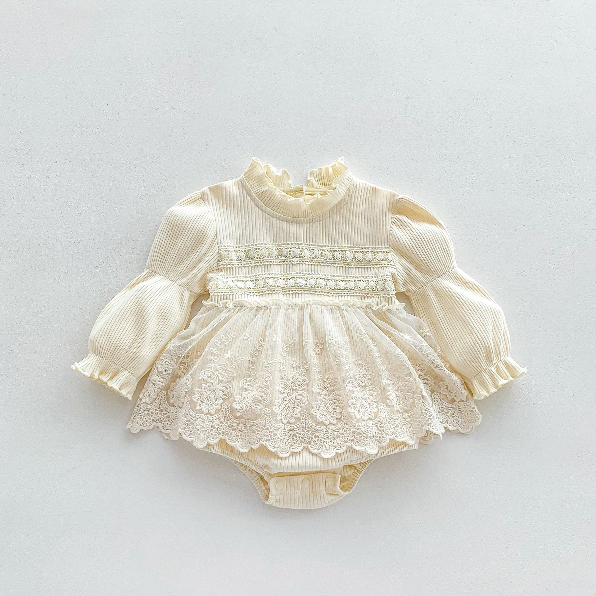 A beautiful white mesh design long sleeve onesie dress for baby girls, featuring floral and plain patterns, perfect for spring and autumn.